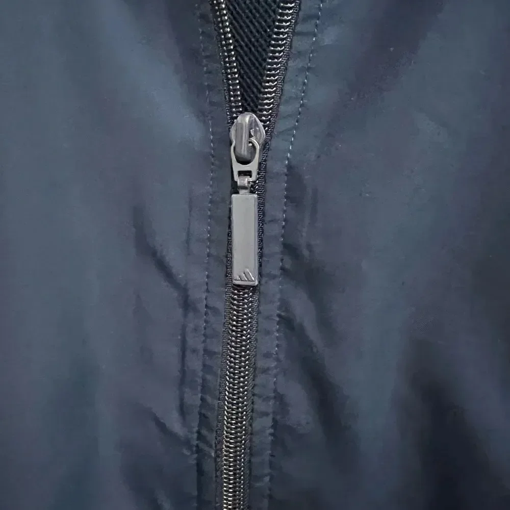Vintage Adidas youth large navy and light green zip up jacket
